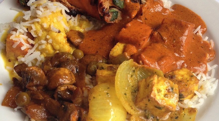 Jai Ho Indian Kitchen signature dishes Lamb Rogan JoshChicken KormaGarlic and Basil Naan